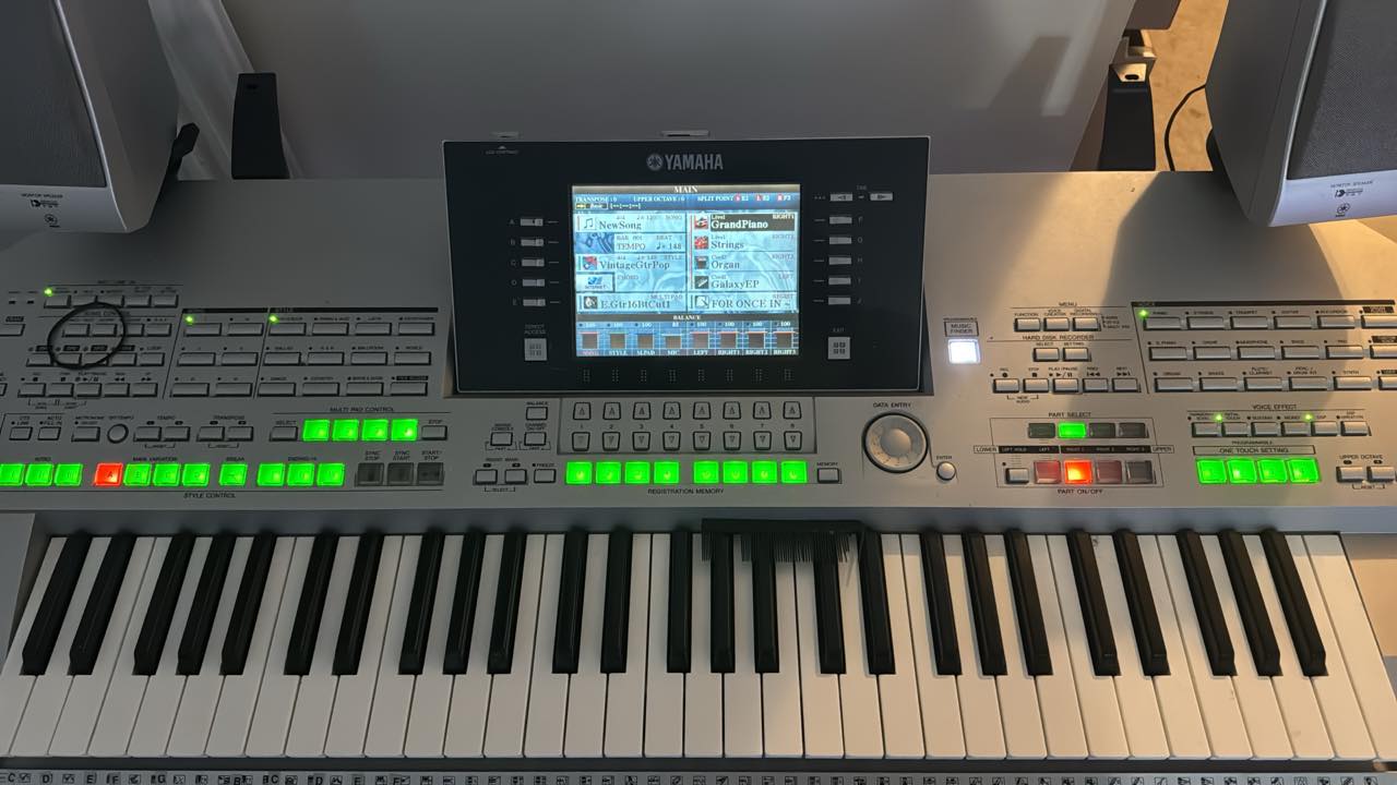 Professional keyboard and audio equipment setup